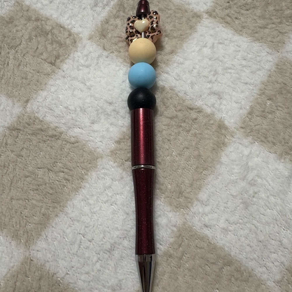 Stylish Beaded Pen with Red and Blue Accents